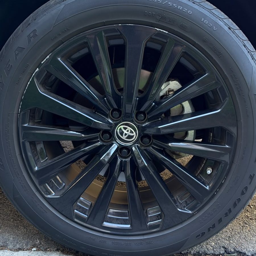 Toyota wheel with curb rash before repair
